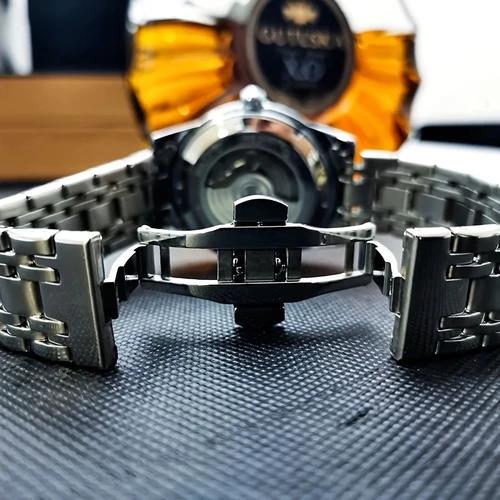 Imagen 2 del producto Elegante reloj mecánico automático para hombre, movimiento Tourbillon, diseño hueco, correa de acero inoxidable, esfera con pantalla de fase lunar, ideal para uso comercial o informal, diseño de reloj romántico de regalo para hombre, regalo para su mejor regalo, no requiere batería