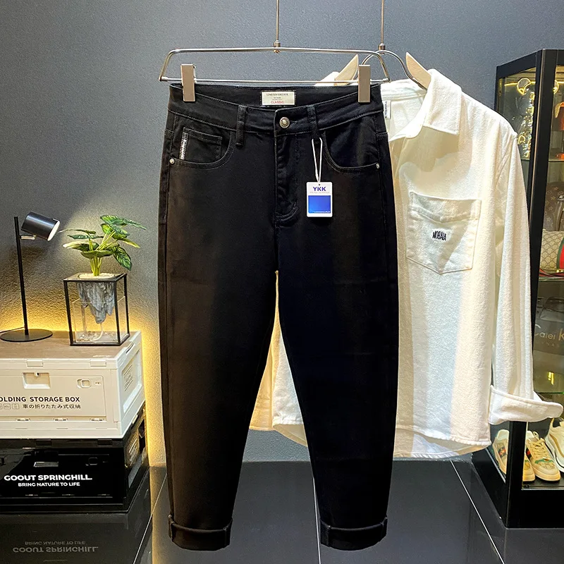 Pantalones vaqueros negros puros para hombre, Vaqueros largos elásticos ajustados, informales de alta gama, moda de lujo asequible, otoño, 2024