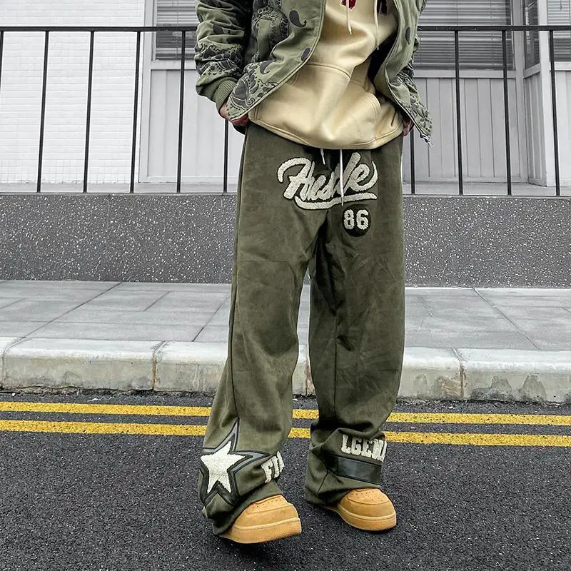 Asciugamani da strada pantaloni sportivi larghi ricamati versione coreana pantaloni Casual da coppia retrò Hip-hop alla moda da uomo e da donna