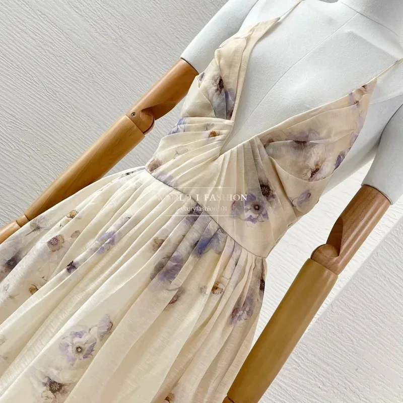 فساتين نسائية رومانسية جديدة لخريف 2025 فستان متوسط الطول مطبوع عليه زهور بيج أزرق بدون أكمام ورقبة على شكل V عميقة #4