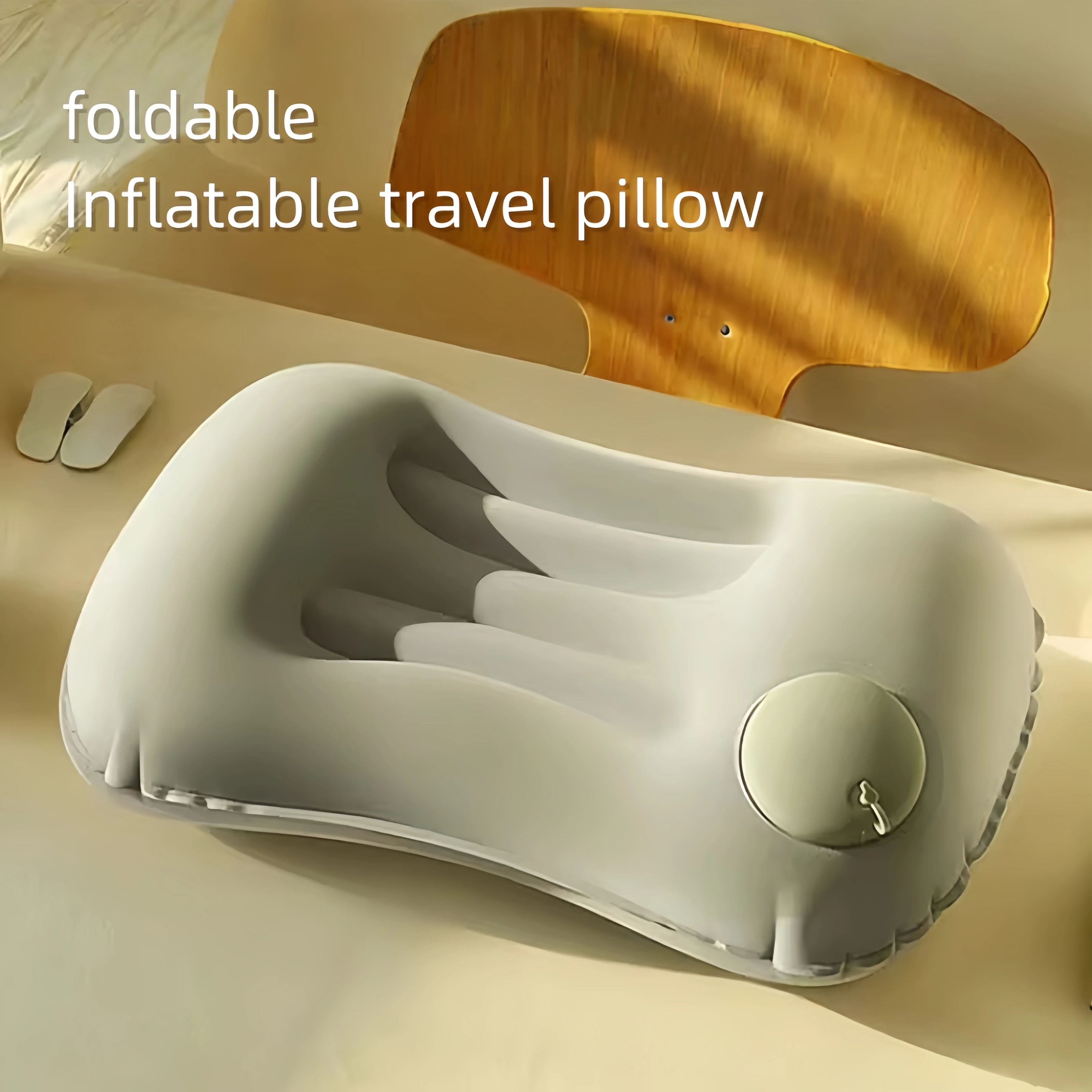 Portable inflatable camping pillow - a lightweight travel air sleeping pillow that provides support for the neck and back.