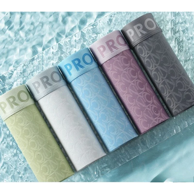 High-grade Ice Mesh Eyes Jacquard Men's Underwear Sexy Boxers Breathable Seamless Quick Drying Boxers with Thin Split Comfort