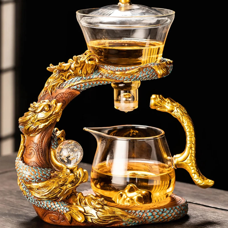 

2024 the Year of the Loong new heat-resistant glass semi-automatic tea set household luxury high-end lazy teapot artifact.