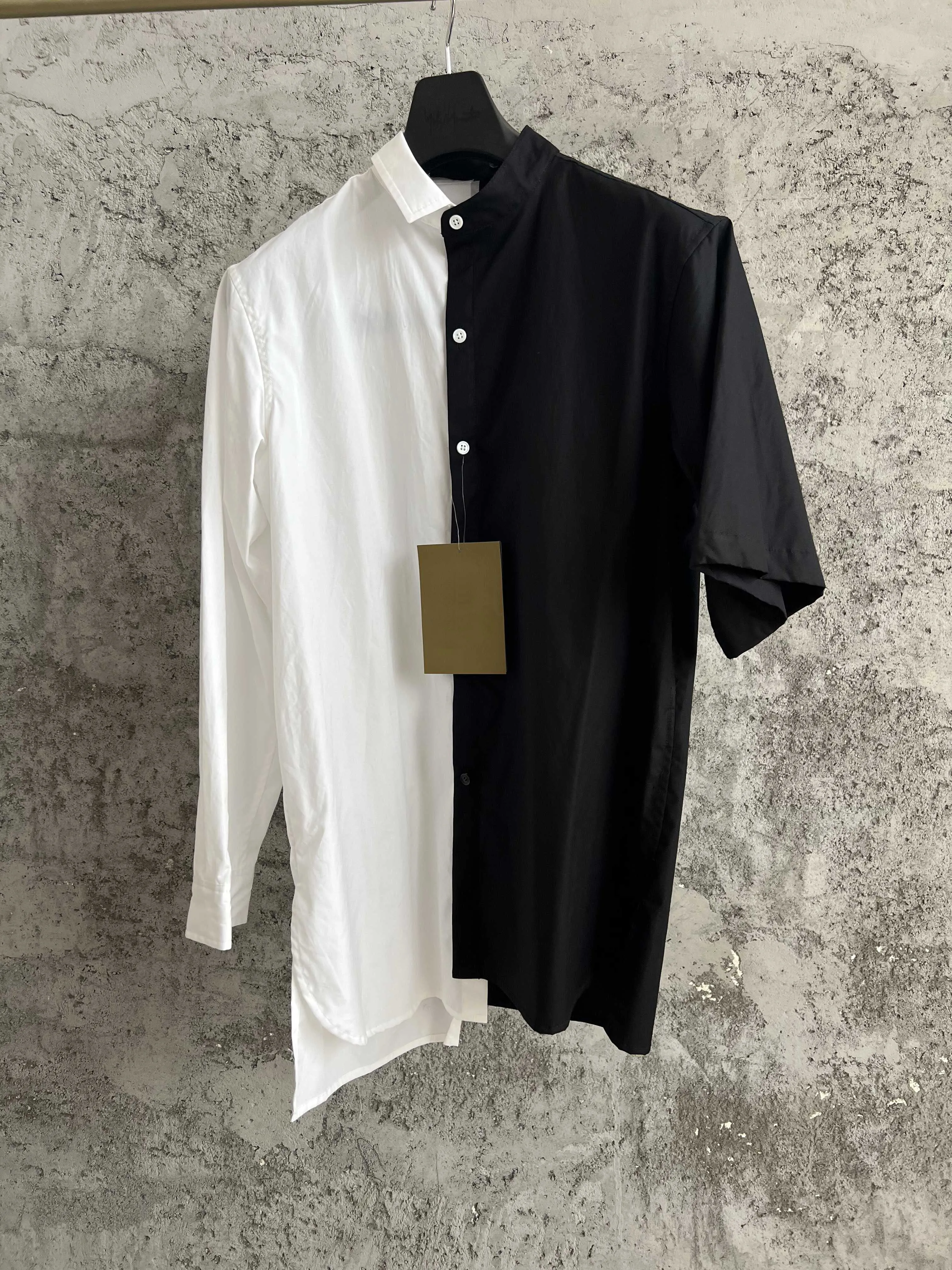 A black and white patchwork pure cotton shirt from a trendy and niche designer brand in a dark style