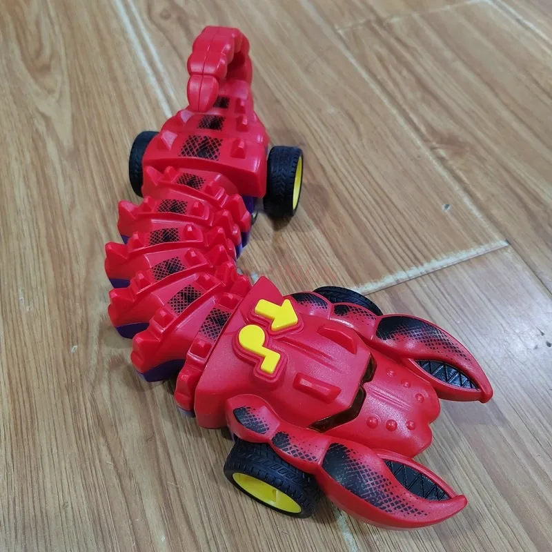 Elettrico meccanico Shark Fighting Bone Car musica per bambini Light Twisting Crawling Scorpion Crocodile Boy Puzzle Toy