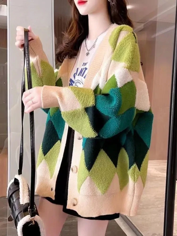 الخريف الشتاء منقوشة شيك بالأزرار زر نفخة الأكمام متقلب المتضخم المرأة البلوزات أنيقة متماسكة معاطف الملابس النسائية