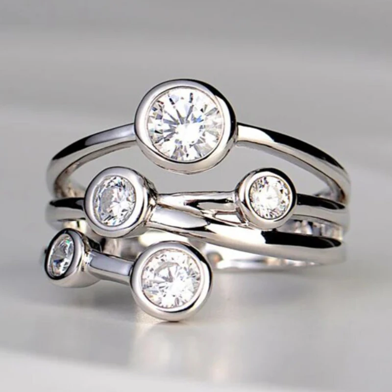 Huitan Trendiger silberfarbener Zirkonia-Ring für Damen, modisch, vielseitig, täglich tragbar, Finger-Accessoires, moderner Schmuck