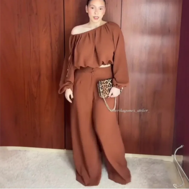 

New fashion straps, one-word collar, lantern sleeves, loose top, high waist and wide pants, simple and versatile temperament, el