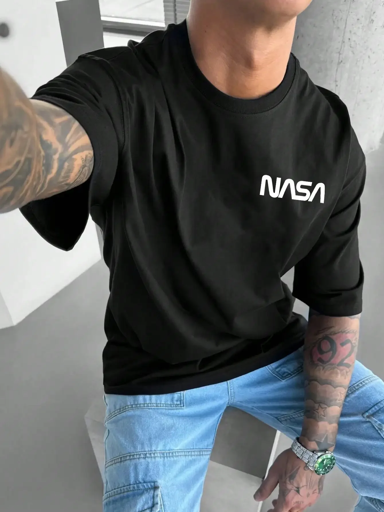 Manfinity Homme Men\'s Summer Astronaut Pattern Printed Round Neck Casual Short Sleeve T-shirt with Slogan, Suitable for Friends