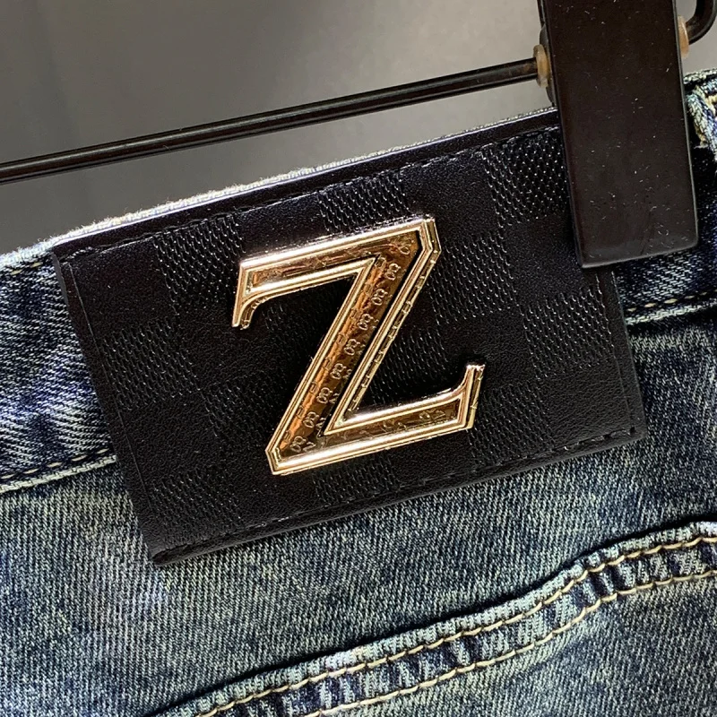 Spring and Autumn 2025 New Trendy Brand Splicing Patch Retro Jeans Men's Pants Slim fit Small Feet Rascal Handsome Denim Pants