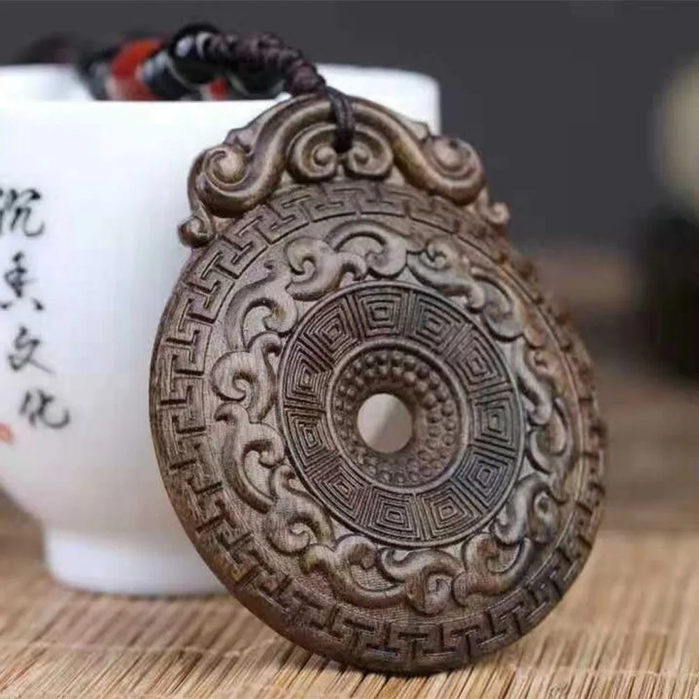 Indonesian agarwood double-sided carved safety buckle, old material, submerged water dragon phoenix auspicious pendant