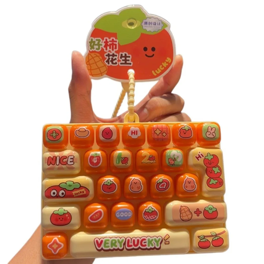 Drückbare Tasten, 26 Tasten, Tastatur-Schlüsselanhänger, zur Stressbewältigung, klare Tastenklänge, mechanische Tastatur, Cartoon-Frucht-Design, Plastik-Fidget – Detail 5