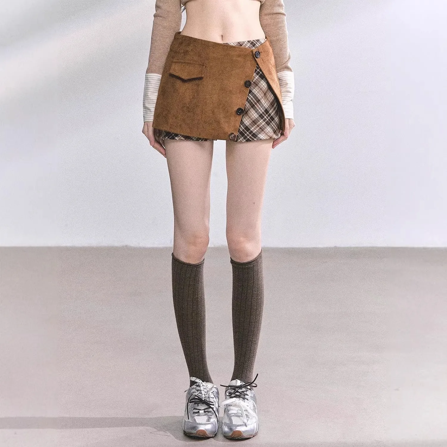 Fabric deer skin air layer irregular half skirt pants set for women's autumn new style temperament fake two pieces