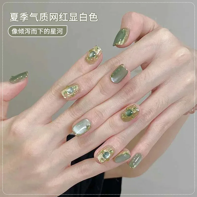 Qingti glass beads cat eye nail polish glue is popular in summer  showing white milk green nail polish