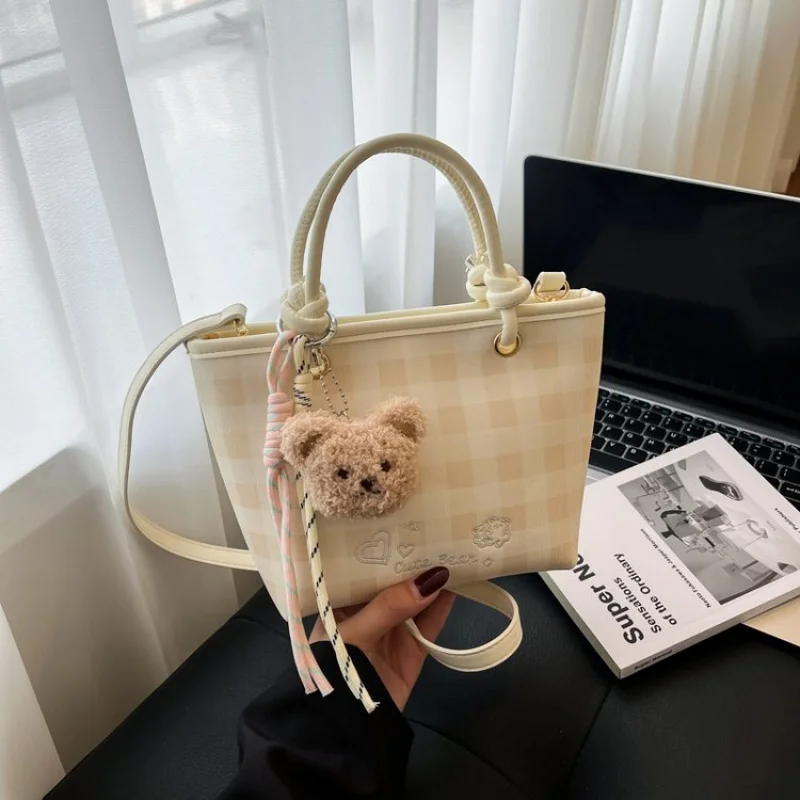 

Luxury Brand Inspired Women Handbag With Signature Pattern For Fashionable Outings And Events