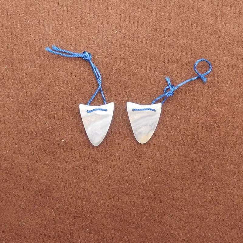 

Polished Blue Lace Agate Triangular Earrings Pair – Natural Blue-White Gemstone with Banded Patterns for Boho Artisanal Jewelry