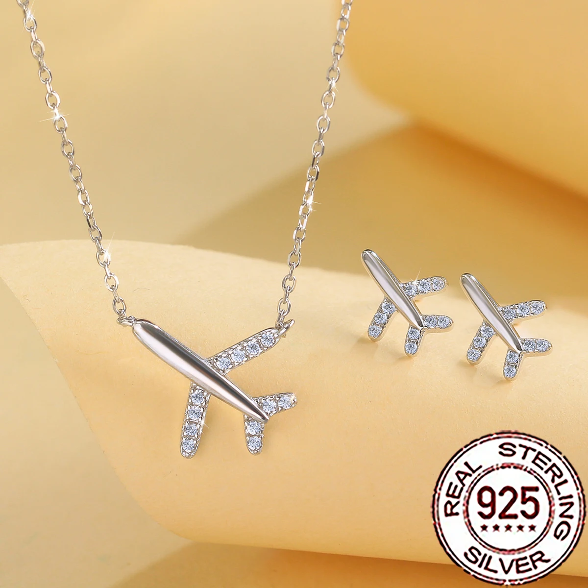 

QooLady, серебро 925 пробы, модное ожерелье с микро-паве и фианитами, дизайн в виде самолета, комплект из 2 предметов для женщин, ювелирные изделия для свадьбы и вечеринок ST050