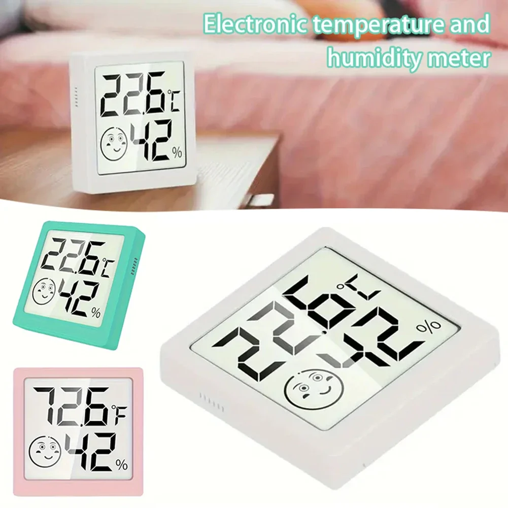 

Smiling expression Small Temperature Humidity Meter Easy Installation Magnetic Moisture Meter For Living Room weather station