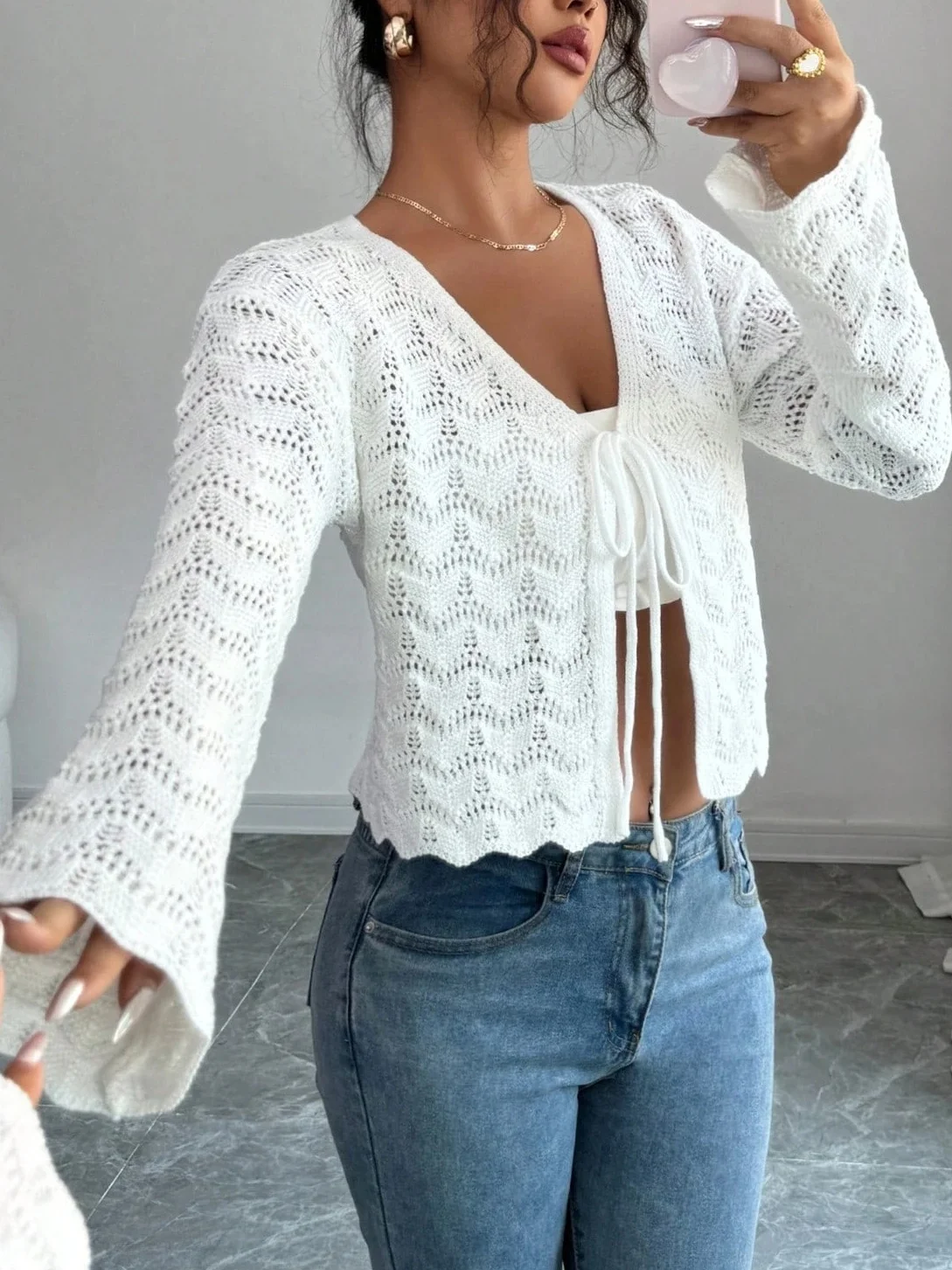 Women's belted cardigan sweater, crocheted, bell-sleeve long-sleeved knit top, suitable for casual outings and commuting.