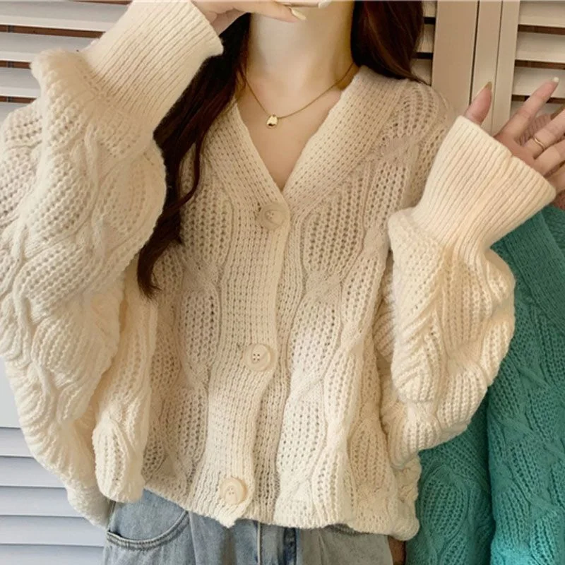 Fashion Solid Color Button Sense of Design Sweaters Cardigan Loose Coat New Long Sleeve Casual Simplicity All-match Lady Top