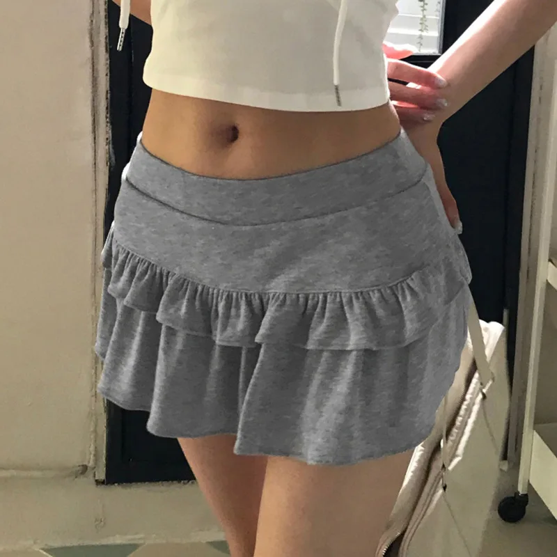Falda corta pequeña y fresca con borde de hongo, Color sólido, cintura baja, picante, para niña, artículo nuevo 2024