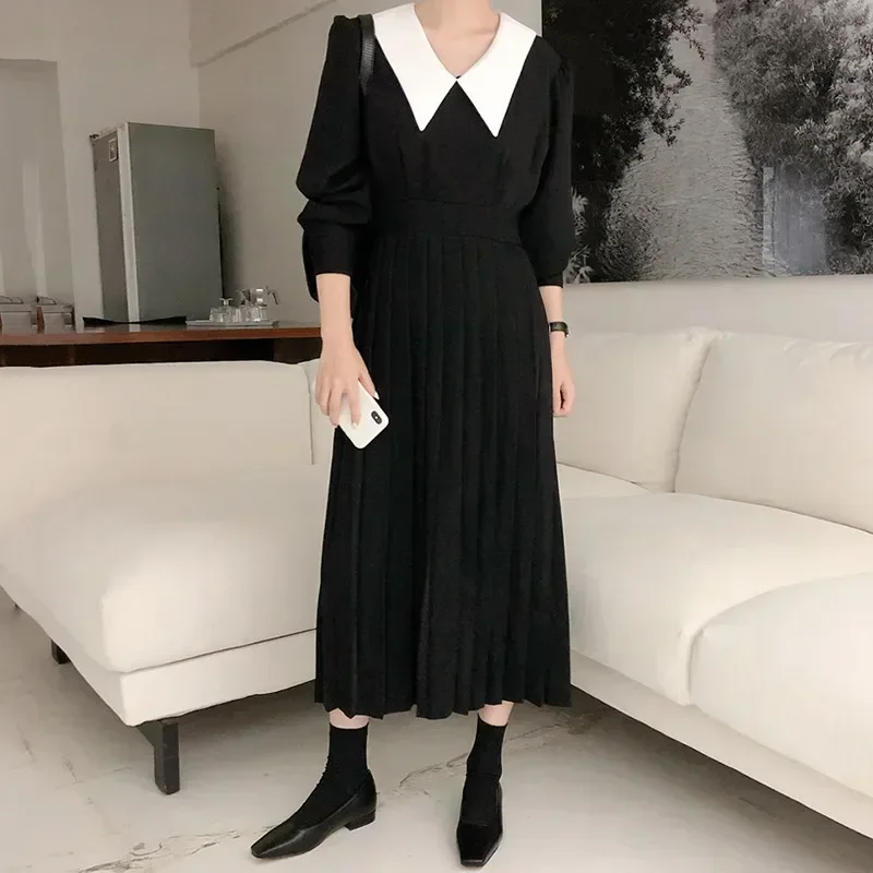 Gaun Midi lengan panjang elegan gaya Hepburn gaun hitam longgar mode musim gugur baru 2024 Gaun A Line berlipat jahitan Lapel