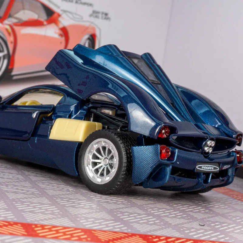 1:32 Pagani Utopia modelo de coche de aleación adornos acústica-ópticos tirar hacia atrás las puertas de juguete para niños se pueden abrir como regalos de cumpleaños.