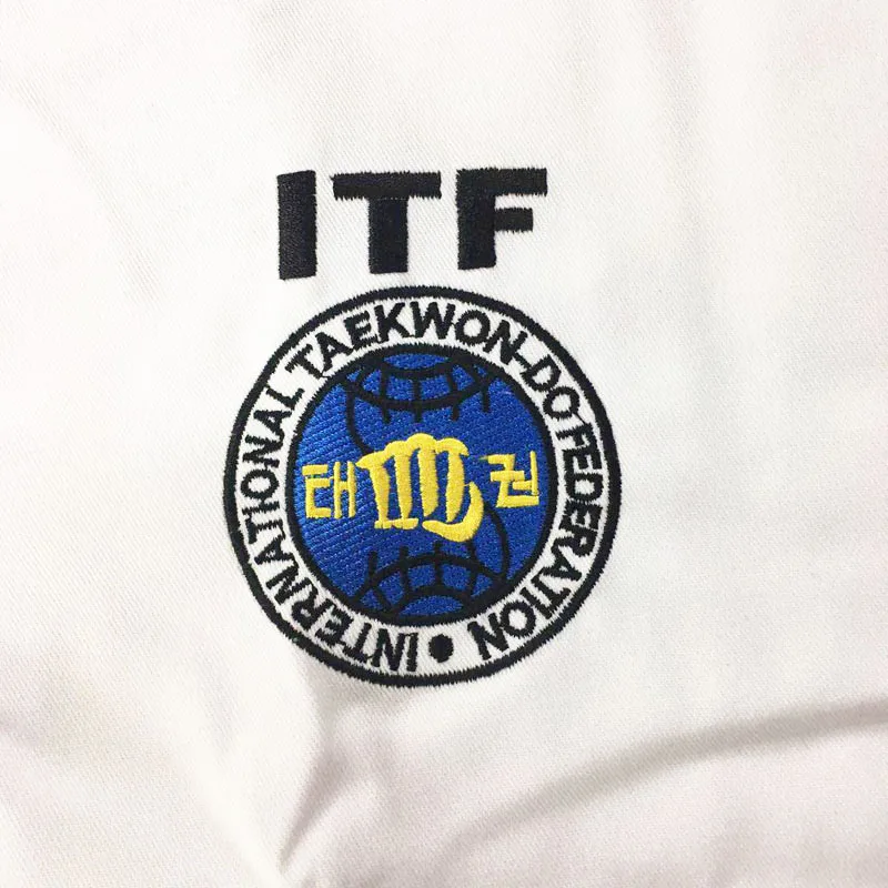 2023 SINOBUDO Taekwondo biały haft standardowy ITF jednolite dla instruktorów mundury mężczyźni Taekwondo mundury garnitur