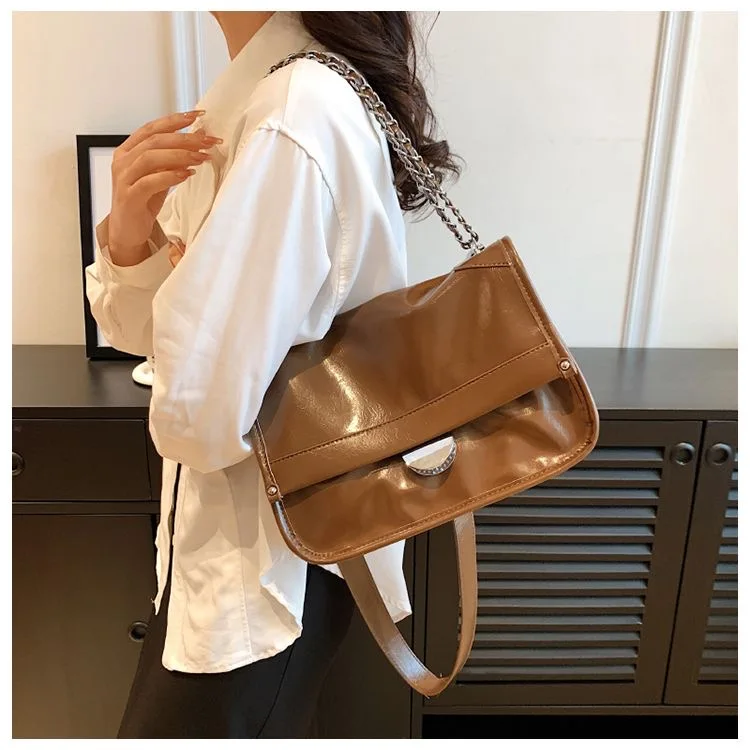 

High-end feeling chain underarm bag women's 2023 new niche silver briefcase fashion messenger bag