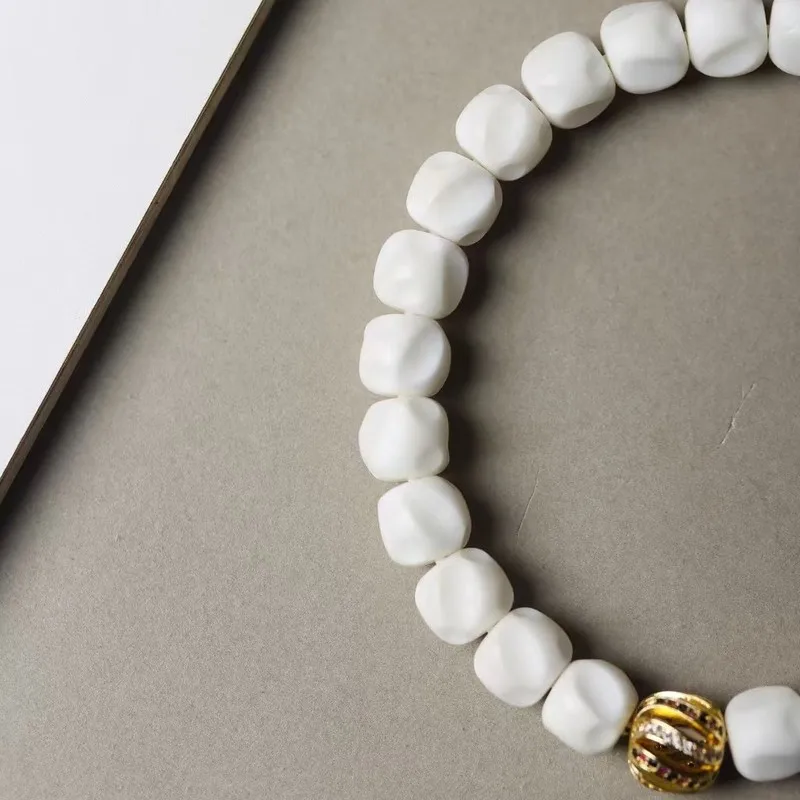 White Jade Bodhi Carved Passion Fruit Seed Single Strand Bracelet