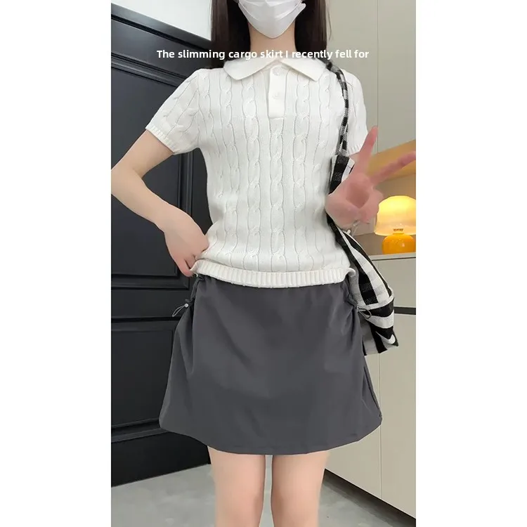 تنورة قصيرة رمادية أمريكية عالية الخصر للنساء صيف 2025 جديدة للأنشطة الخارجية والترفيهية نصف تنورة مضادة للكشف بأسلوب ملابس ا...