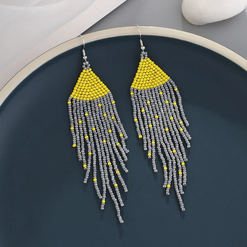 

Rice Bead Earrings Hand weaving Retro Bohemia Simplicity Eyes National style‘ Geometry alloy ma'am Tassel Earrings