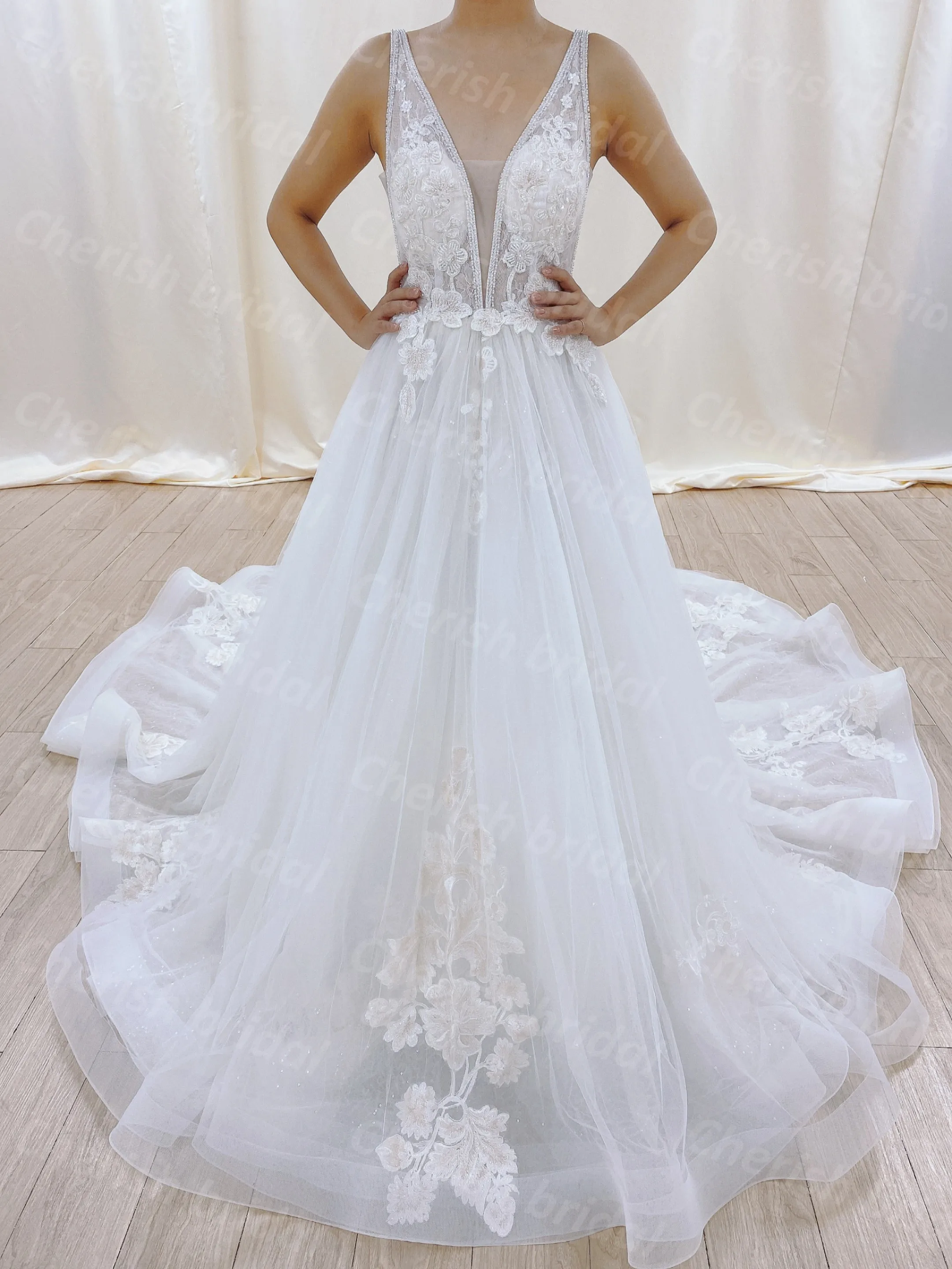 

C1002A Sexy Wedding Dress Deep V-neck Tank Sleeve A-line Bride Dress Backless Ivory Lace Applique and Beading Bridal Gown