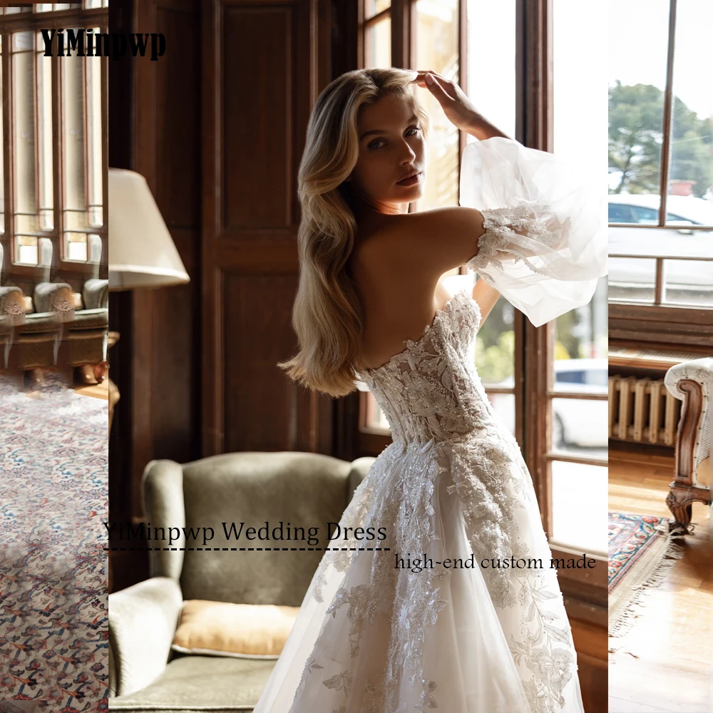 Vestidos De Novia Vintage Vestidos De Novia elegantes sin tirantes batas sin espalda Apliques De encaje Vestidos glamorosos De Novia personalizados 2025