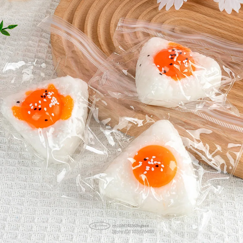 لعبة إسفنجية لصفار البيض - كرة ضغط من السيليكون الآمنة للطعام، لعبة كرة الأرز كاواي للقلق والتركيز