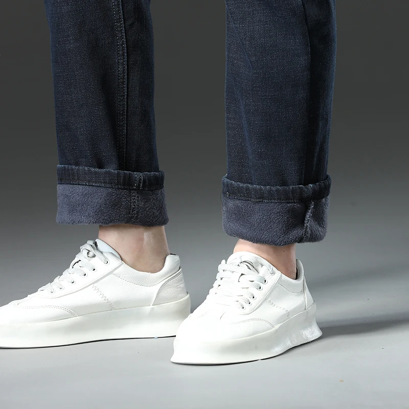 جينز شتوي من الصوف لعام 2025 للرجال دافئ مخملي سميك فضفاض من قماش الدنيم بنطلون كلاسيكي غير رسمي للأعمال باللون الأسود والأزرق