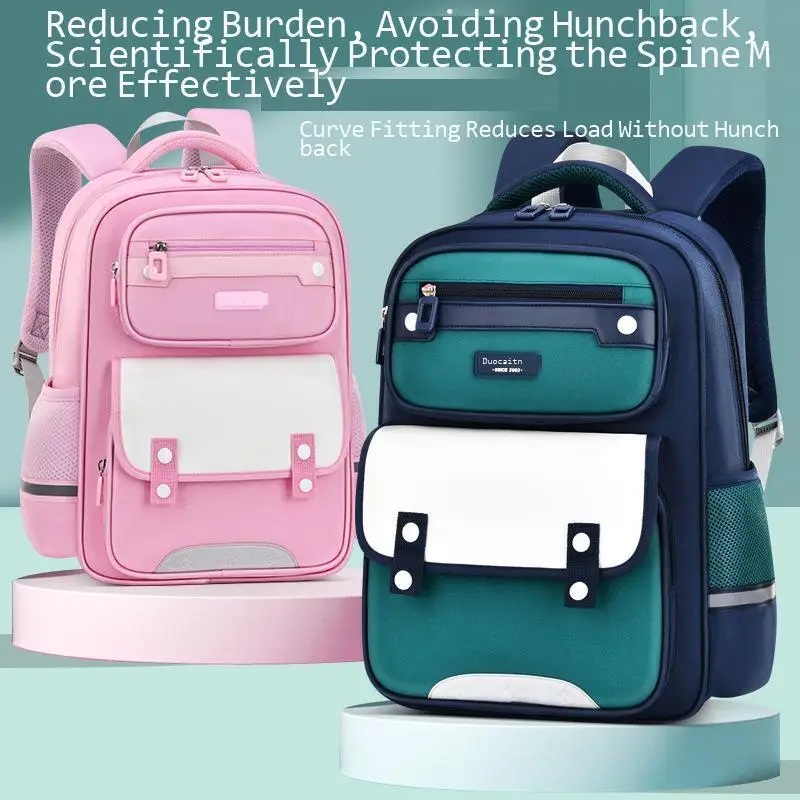 New elementary school backpack for boys in British style large capacity lightweight load reducing and spinal protection