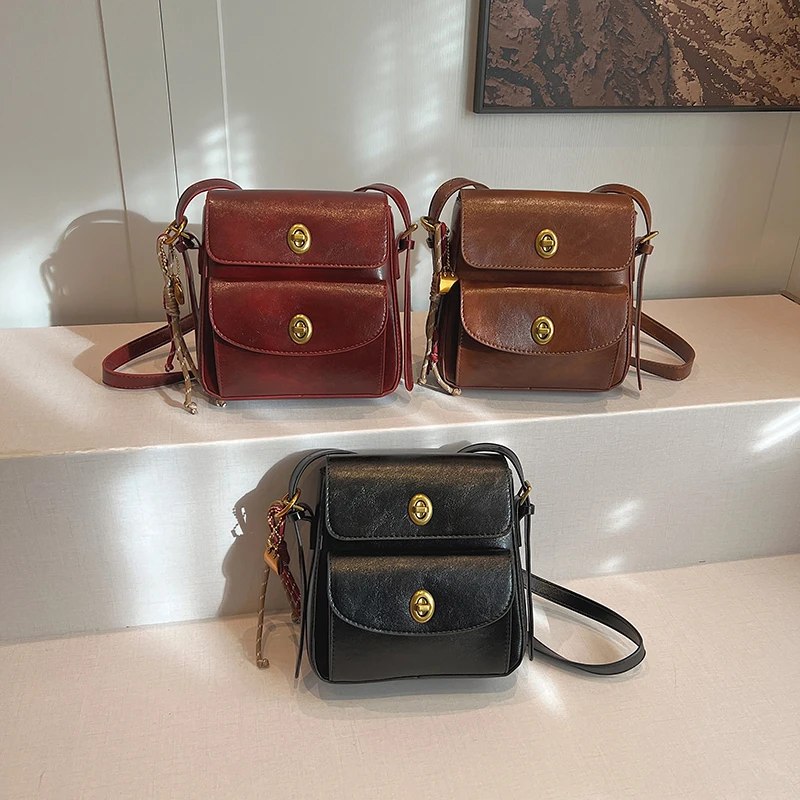 MOODS Vintage Fashion Cross Body Bags For Women Waxed PU Leather Shoulder Bag With Pendant Decor Versatile Commute Messenger Bag