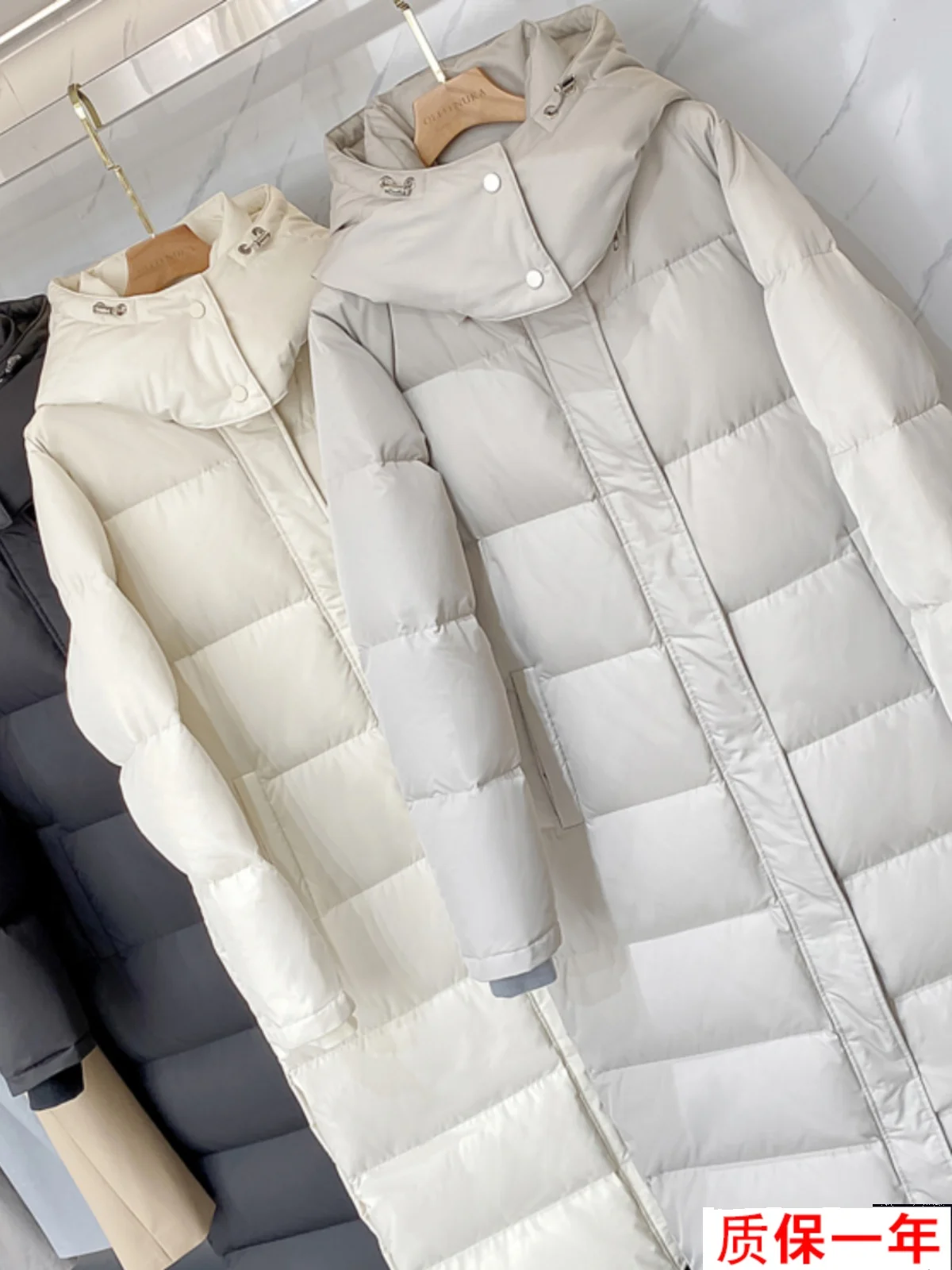 2024 Nieuwe Witte Gans Dames Donsjas Enkellange X-lange Zwart Wit Mode Verdikte Extra Warme Sneeuwkleding Winddicht Waterdicht