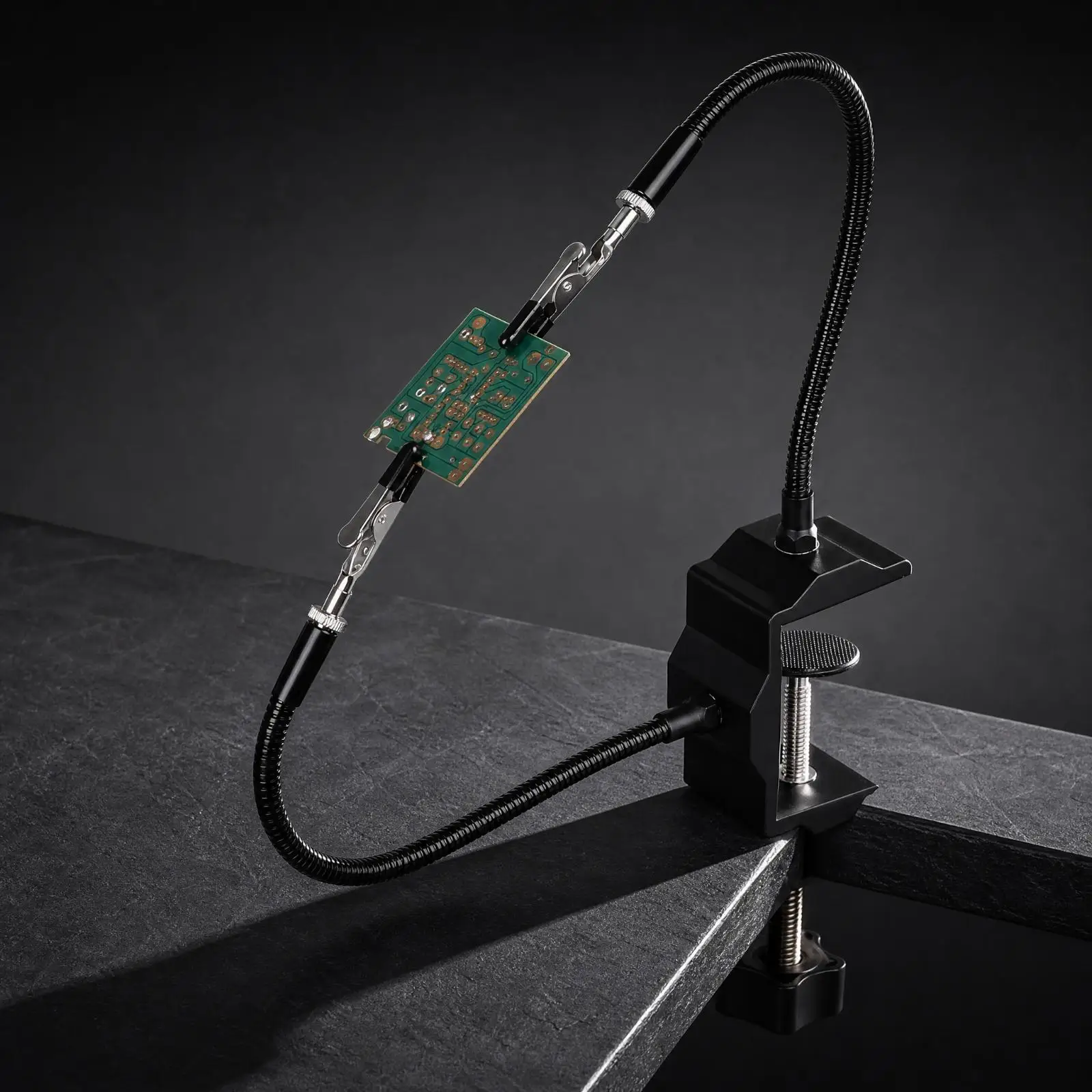 Portable Soldering Aid with Clamping Base and Rubber Pads for Precision Electronics Projects