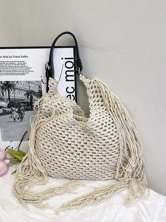 2026 Retro Tassel Bag Women's Hollow Out Woven Bag Beach Bag New Women's Shoulder Tote Bag
