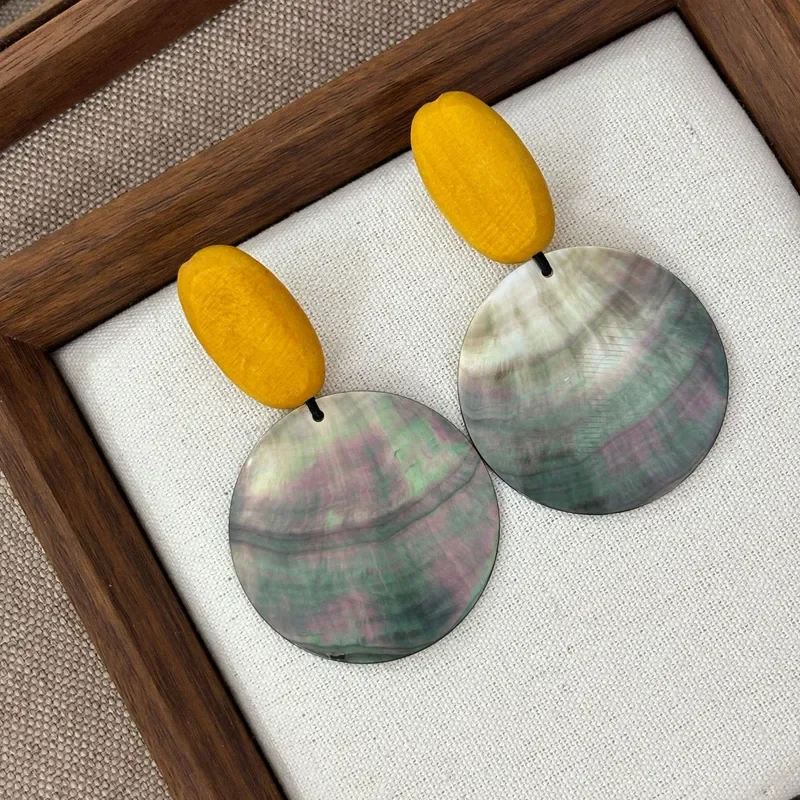 Retro contrasting color yellow wood beads black butterfly shell large round piece earrings literary niche natural shell