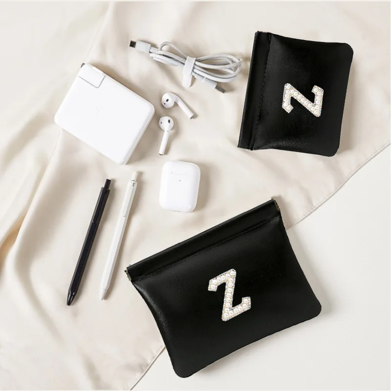 

Pearl letter sticker PU bullet storage bag, earphone lipstick, change, makeup bag, fashionable and exquisite mini bag