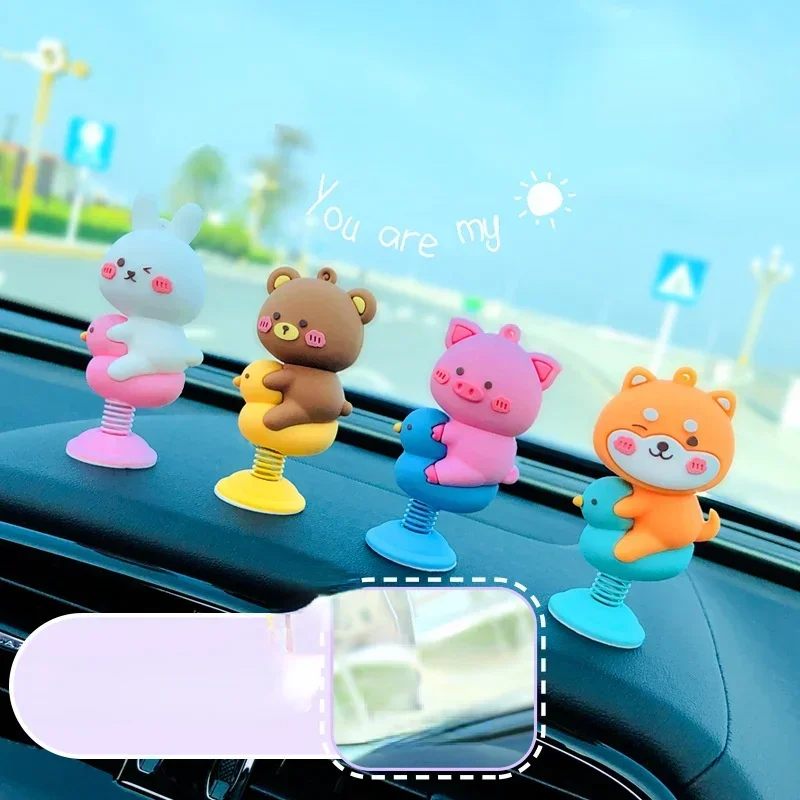 Car ornaments shaking his head doll cartoon cute center console car spring interior net red car interior decoration supplies