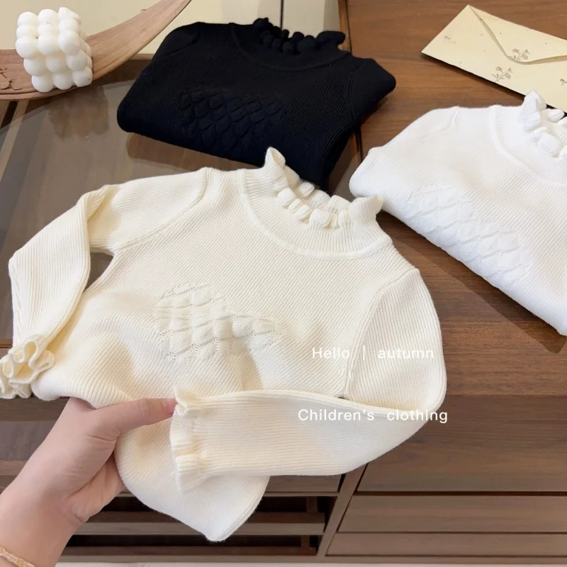 

Girls' Sweater 2026 New Spring and Autumn Baby Girl Solid Color Half High Neck Base Sweater Knitted Sweater Korean Version