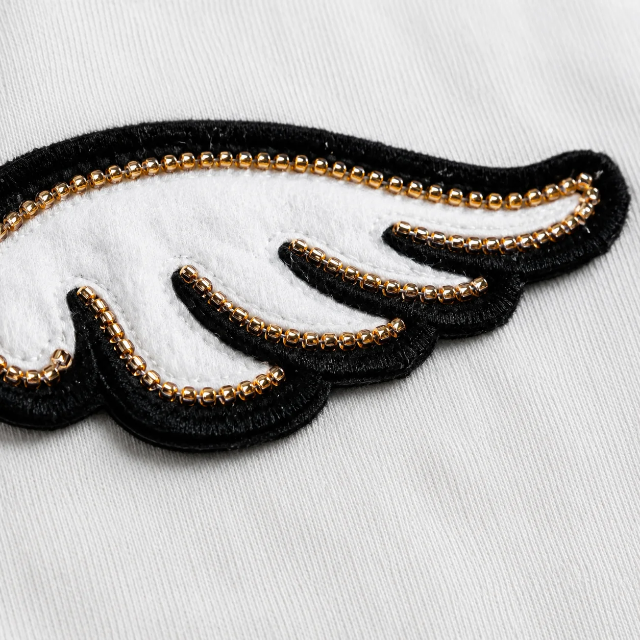 Black white contrast embossed patch wing baby onesie 4 piece knit beanie scratch mittens soft shoes newborn photo costume