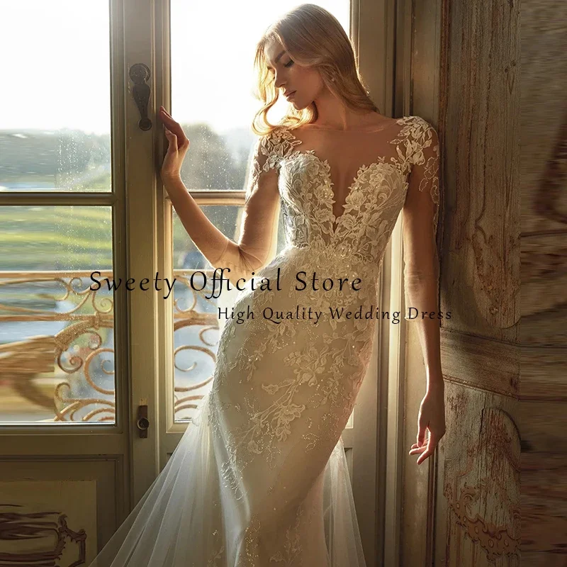 สง่างามเงือกชุดแต่งงานปักลูกไม้สุทธิกับO-คอShortsleeves BridedressเปลือยVestido De N Oviaที่กําหนดเอง