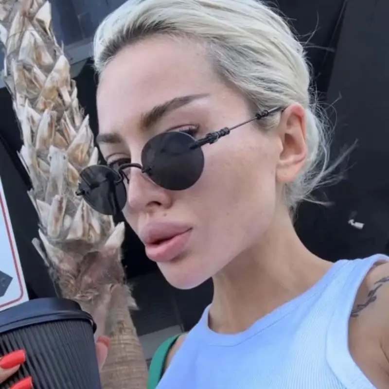 

Высокомодные элитные брендовые безрамочные очки, овальные солнцезащитные очки из чистого титана для мужчин и женщин, солнцезащитные очки для украшения вечеринки в путешествии