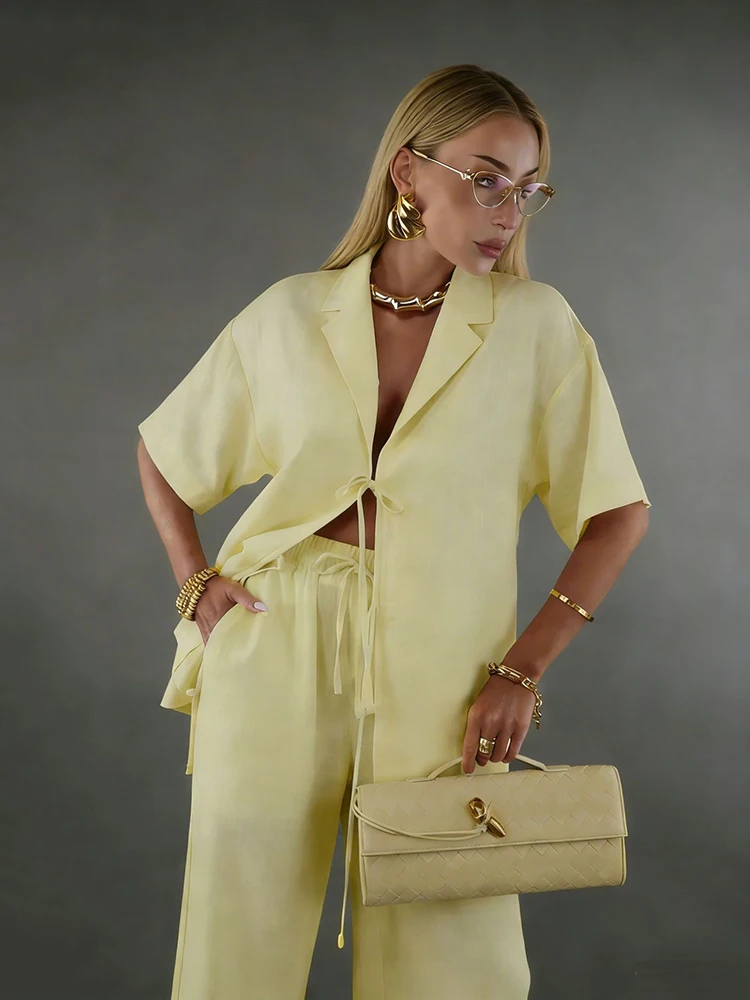 

Весенний хлопковый брючный костюм для женщин: кардиган с лацканами, топ на шнуровке + брюки с высокой талией и широкими штанинами на шнурке, осенний женский комплект из двух предметов