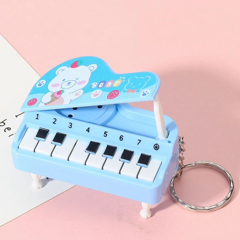 Criativo dos desenhos animados música piano eletrônico chaveiros engraçado brinquedos de som mini instrumento musical piano pingente chaveiro presente aniversário